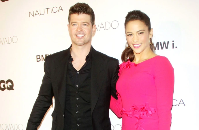 Robin Thicke and Paula Patton