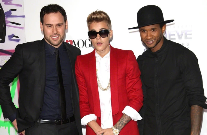 Justin Bieber is not breaking up with his long-time manager Scooter Braun