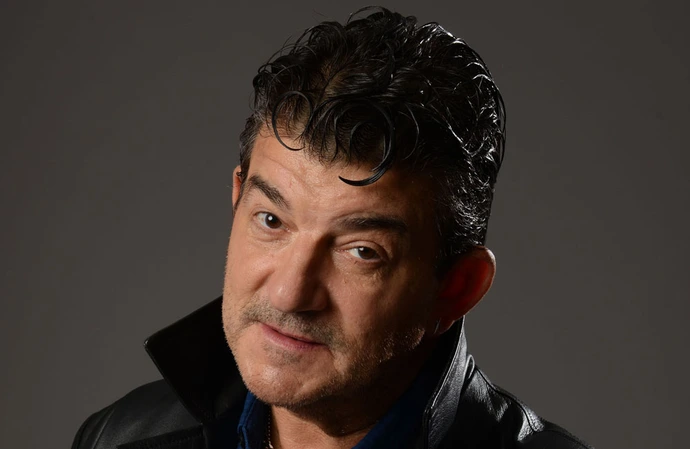 John Altman as Nasty Nick Cotton