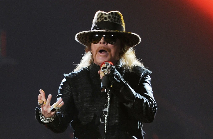 Axl Rose tried to comfort Lisa Marie Presley over the suicide death of her son