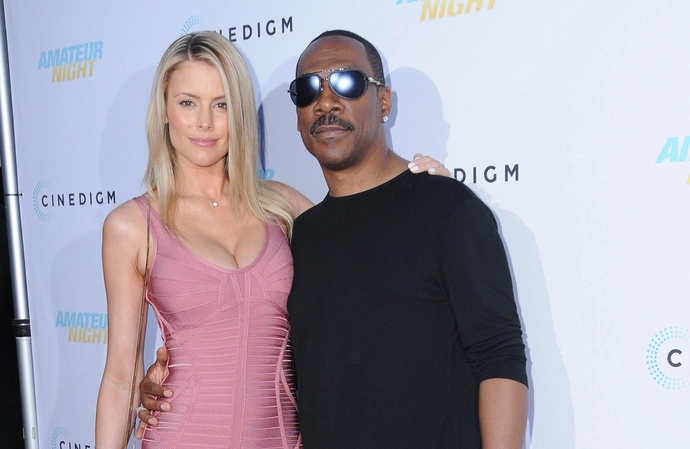 Eddie Murphy has sparked speculation he married Paige Butcher