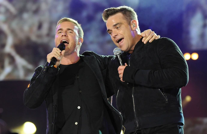 Robbie Williams and Gary Barlow have reunited for a new song