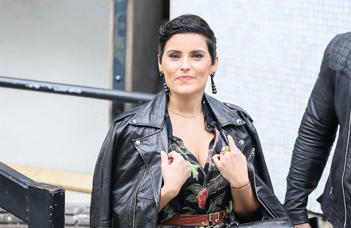 Nelly Furtado thinks young people experiment too much with their skin