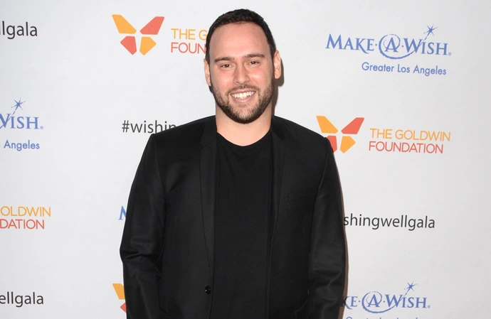 Scooter Braun has a new lady in his life and things are getting 'very serious'