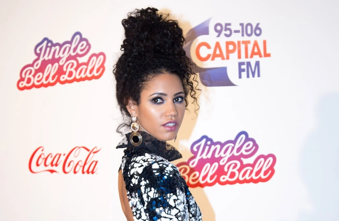 How did she land her first big break in the media?
