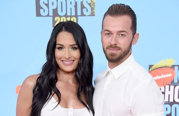 Artem Chigvintsev accused Nikki Garcia of throwing her shoes at him