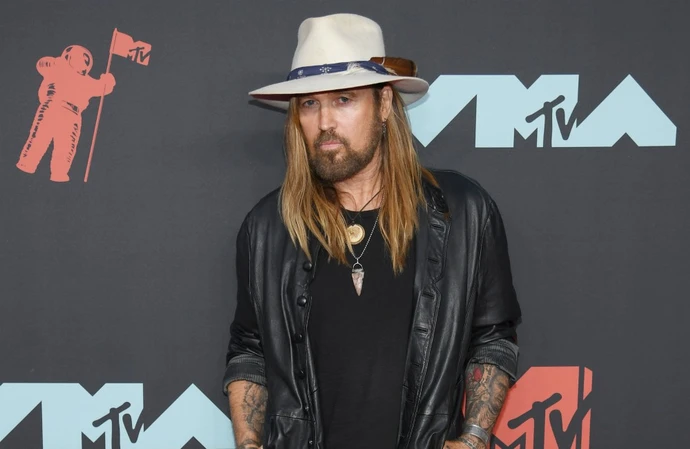 Billy Ray Cyrus 'happy to be out of marriage'