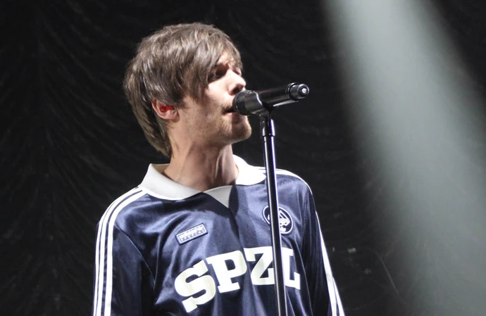 Louis Tomlinson admits he chased a hit with 'Just Hold On'