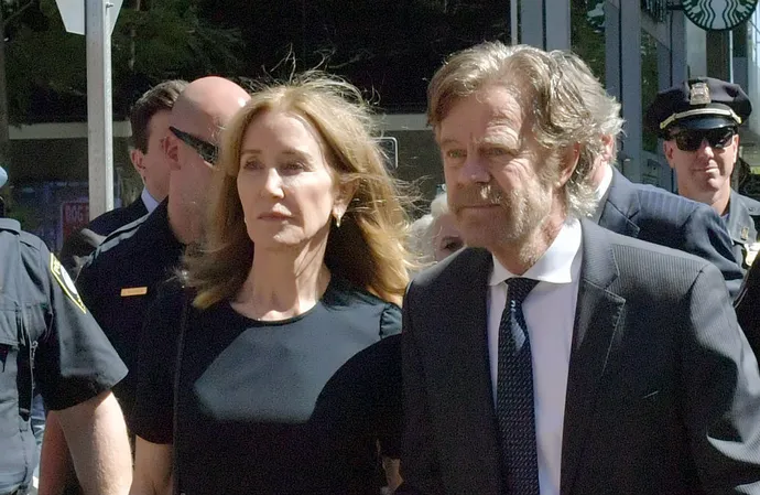 Felicity Huffman and William H Macy outside court during the college admission scandal trial