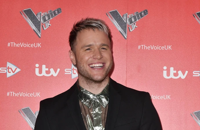 Olly Murs is trying to fit his wedding plans around work