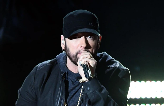 Eminem's former employee has been charged with selling and leaking his unreleased songs