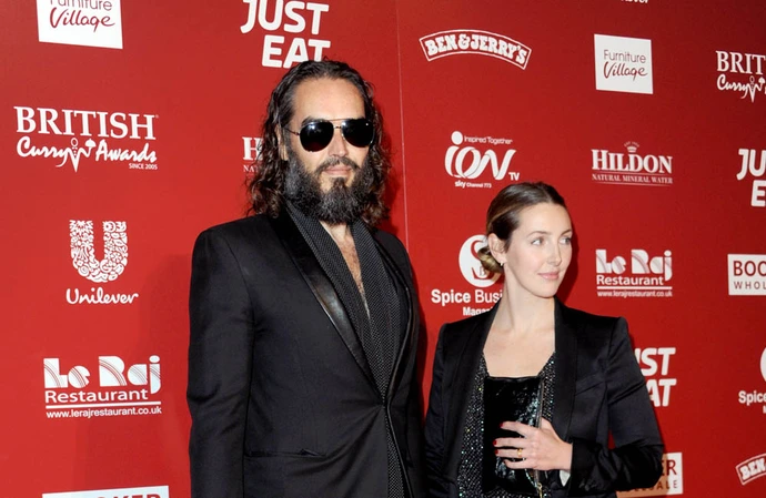 Russell Brand is expecting his third child with wife Laura Gallacher