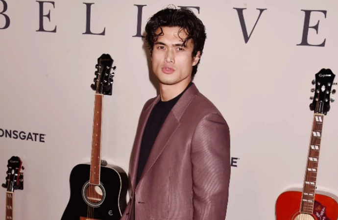 Charles Melton played football during his younger years