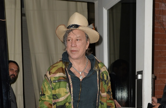 Mickey Rourke has given up his gun