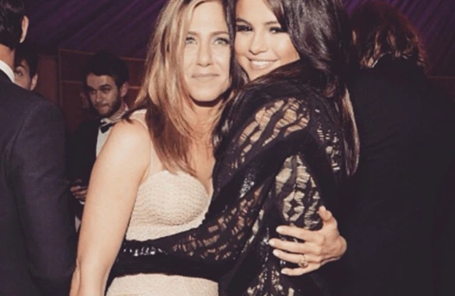 Jennifer Aniston has shared Selena Gomez has helped her to 'lean into social media'