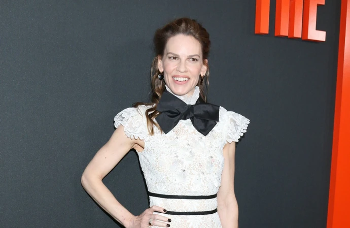 Hilary Swank has fallen even more in love with her husband after seeing him with their babies