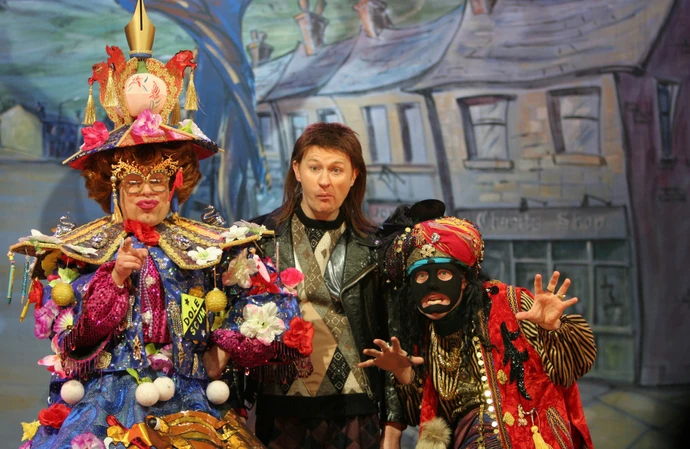 The League of Gentlemen preforming live, including Reece Shearsmith as Papa Lazarou (right)