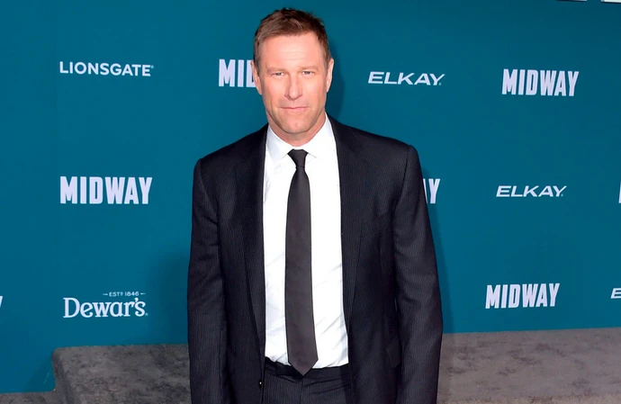 Aaron Eckhart has replaced Alec Baldwin in Chief of Station