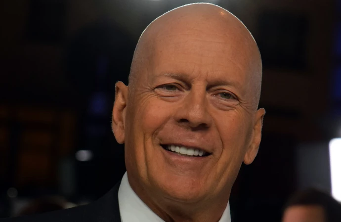 Dementia-stricken Bruce Willis allegedly misfired a gun on a film set and needed someone to read his lines to him through an earpiece as his brain condition aphasia worsened