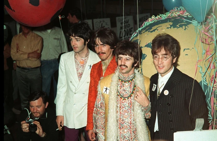 Ringo Starr with his Beatles bandmates, including George Harrison