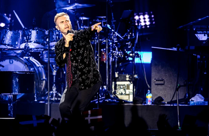Gary Barlow talks to his dogs after his one-man show