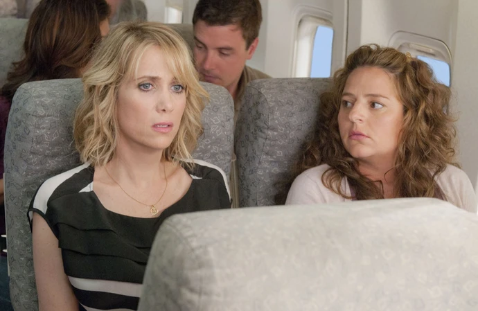 The movie's co-writer Annie Mumolo plays the nervous passenger on the plane