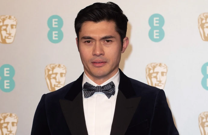 Henry Golding has confessed to talking to himself