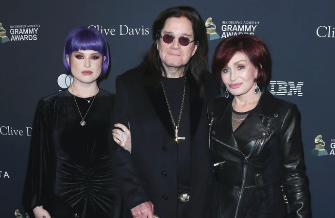 Kelly Osbourne with parents Ozzy and Sharon