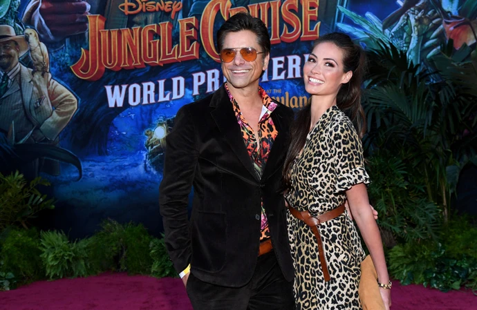 John Stamos is proud of wife Caitlin McHugh