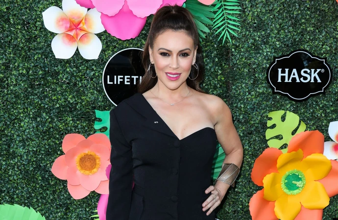 Alyssa Milano has had to defend herself after a troll accused her of being selfish for asking for donations for her son's baseball team despite her wealth
