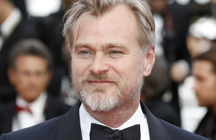 Christopher Nolan thinks it would be an ‘amazing privilege’ to direct a James Bond film – but only if he could choose the 007 star