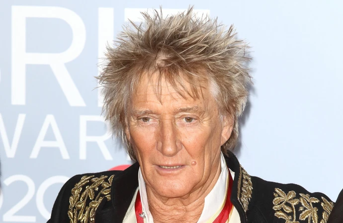 Sir Rod Stewart has visited patients at a hospital after paying for them to have scans