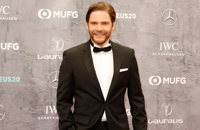 Daniel Bruhl has lavished praise on Karl Lagerfeld