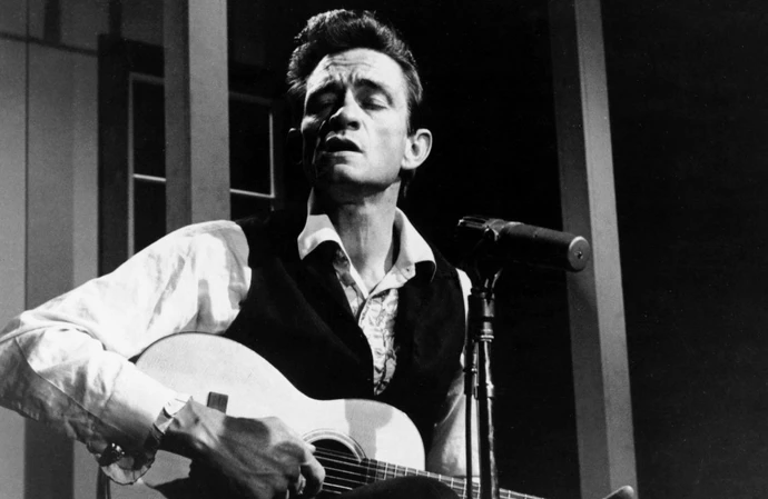 Johnny Cash's son and former bandmate have remembered the music legend
