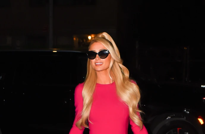 Paris Hilton says she only acts at being a 'dumb blonde'