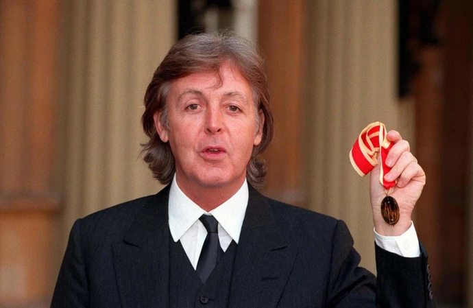 Sir Paul McCartney was knighted by Queen Elizabeth II in 1997 for his services to music
