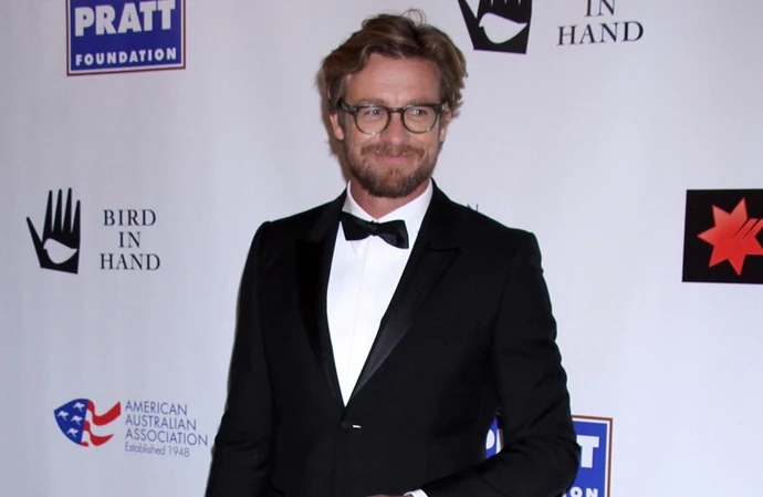 Simon Baker was arrested