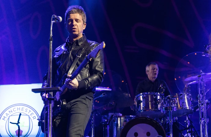 Noel Gallagher thinks his younger self would have “knifed him in the b*******” over his decision to collaborate with Damon Albarn