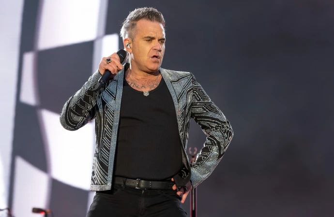 Robbie Williams will be joined by former Take That bandmate Mark Owen for the pair of concerts