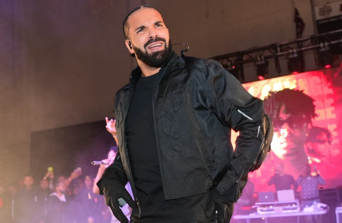 Drake was almost hit in the face by a book thrown onstage at his gig in California