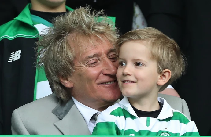Sir Rod Stewart’s son Aiden was rushed to hospital in an ambulance with a suspected heart attack after he collapsed at a football match.