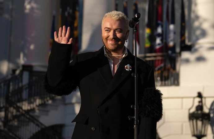 Sam Smith and Cyndi Lauper salute the president for signing the same-sex federal law