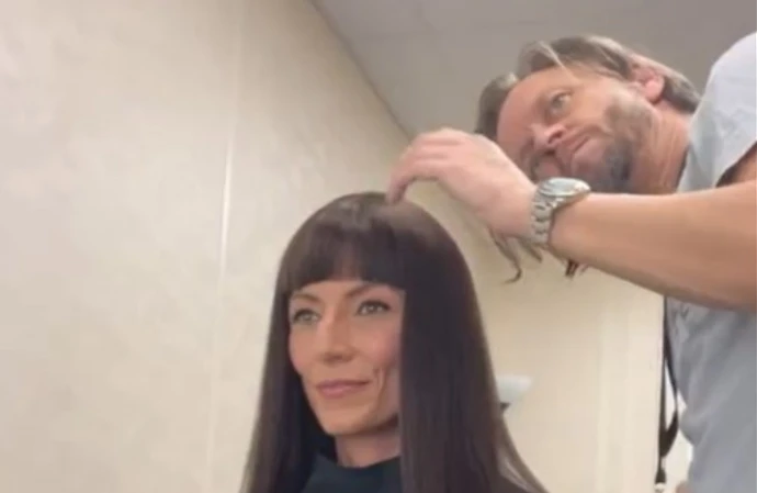 Davina McCall wore a wig on The Masked Singer
(C) Michael Douglas/Instagram