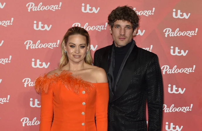 Kimberly Wyatt and Max Rogers are happy being a family of five