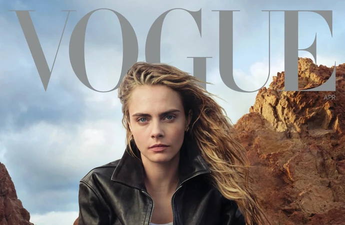 Cara Delevingne covers the new issue of Vogue