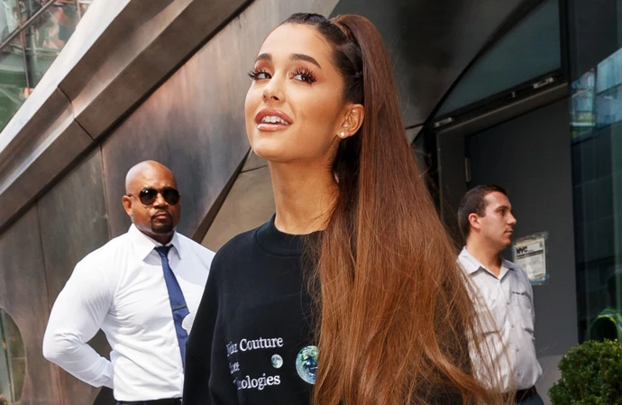 Ariana Grande is said to have moved in with Ethan Slater