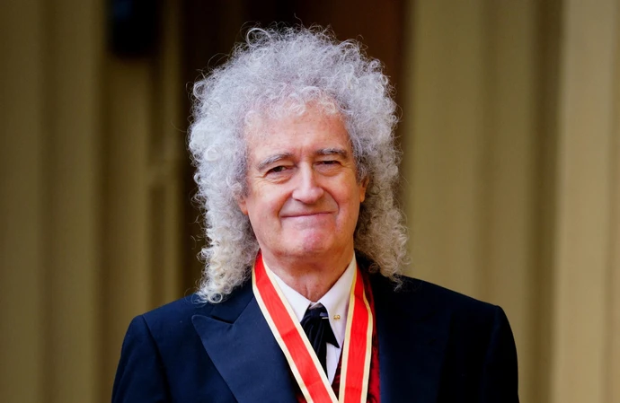 Sir Brian May said he wants to keep on rocking after he was knighted by King Charles