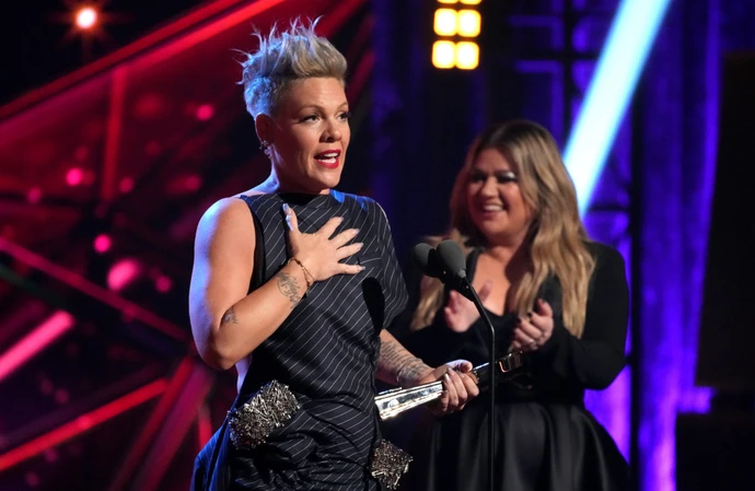 Pink admitted it felt like a 'miracle' to perform with Kelly Clarkson at the iHeartRadio Music Awards, where she picked up the Icon Award