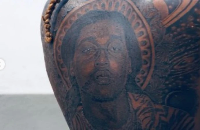 Offset shows off his epic back tattoo of late cousin Takeoff