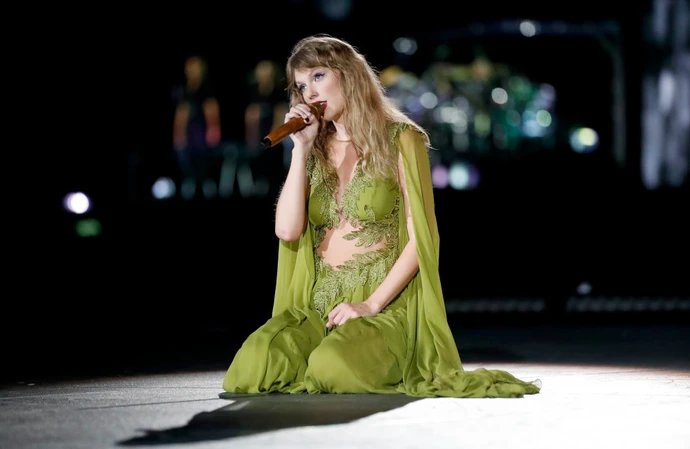 Taylor Swift concert security guard claims he was fired after asking fans to take his picture